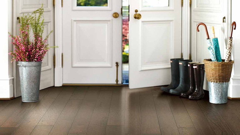 durable waterproof luxury vinyl plank flooring in an entryway, a perfect flooring solution for Syracuse, New York, homes