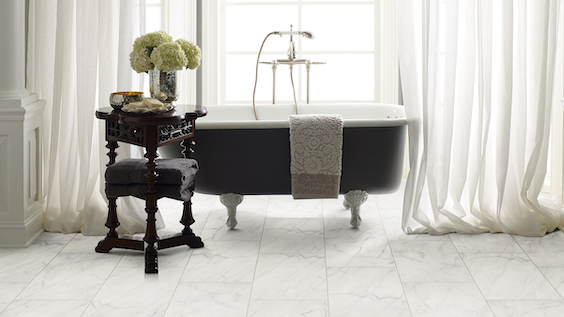 classy white marble tile flooring in an elegant bathroom